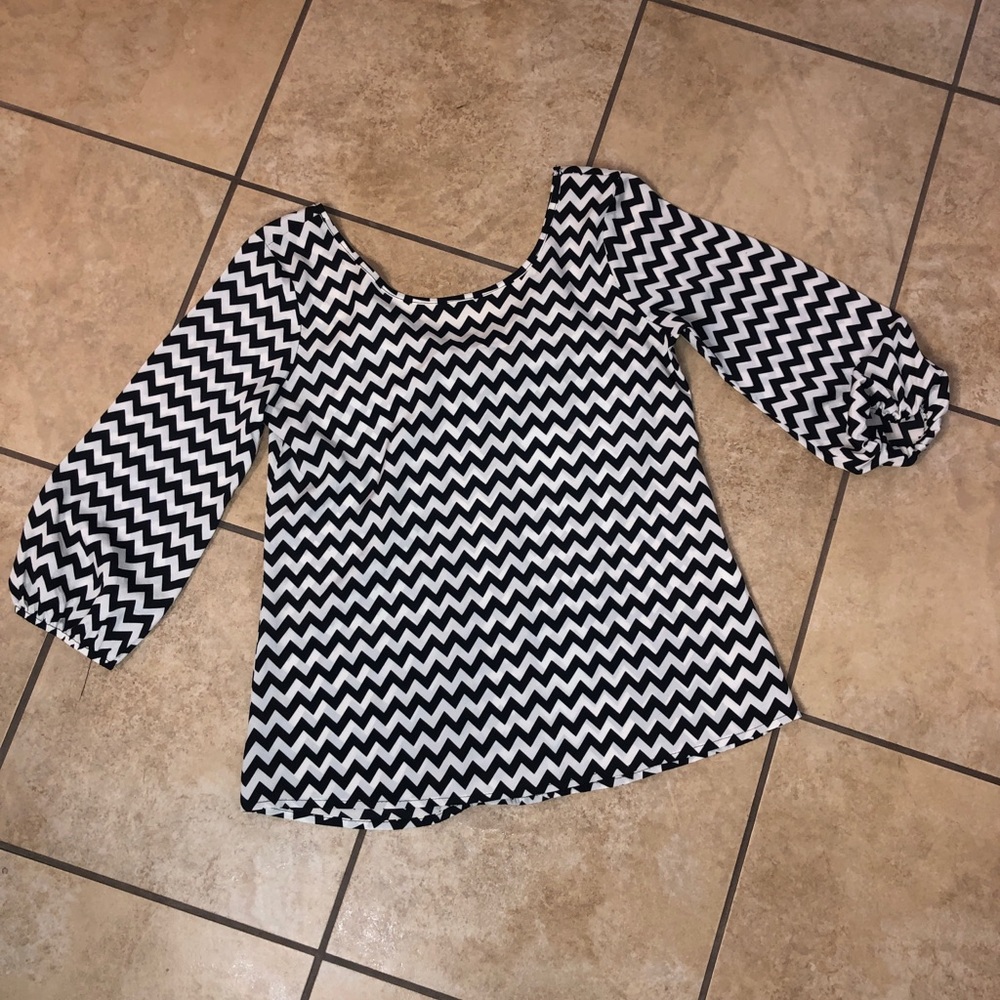 A black and white chevron pattern children's shirt